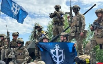 Russian volunteers raised their flags in another village on the territory of the Russian Federation